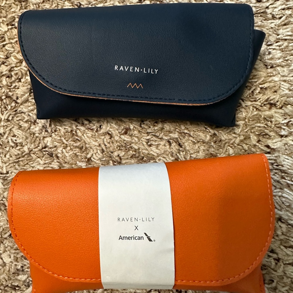 AAM premium economy class Raven + Lily Navy and Orange Amenity Pouches